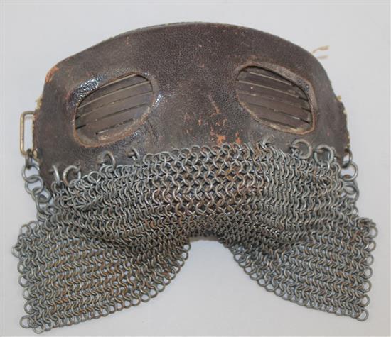 A WWI leather and chainmail tank mask, 7in.